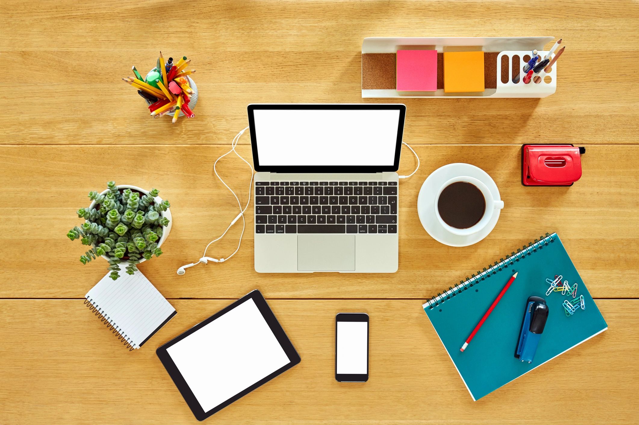 Modern consumer electronics arranged on a desk